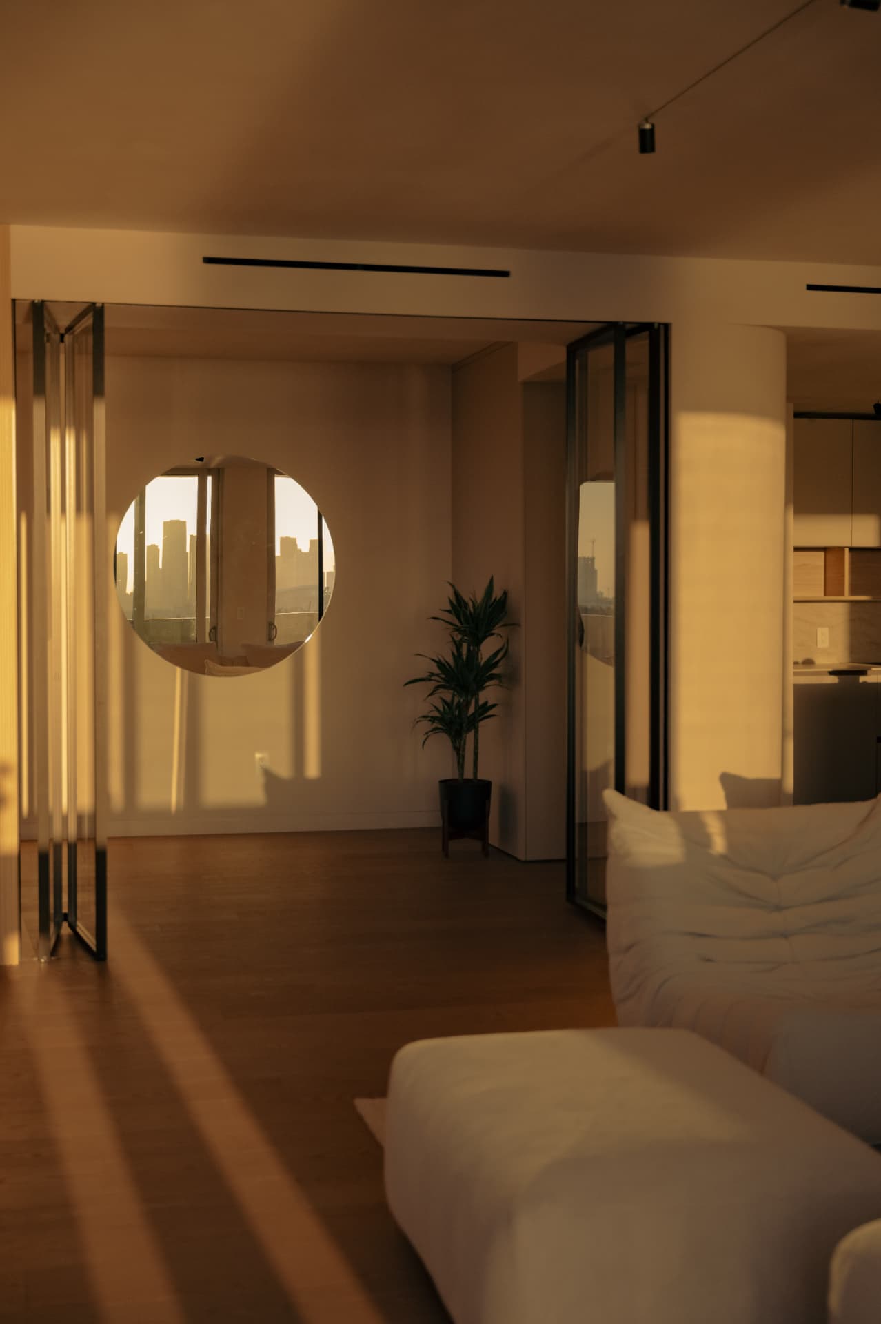 PH 11:11, round mirror at golden hour